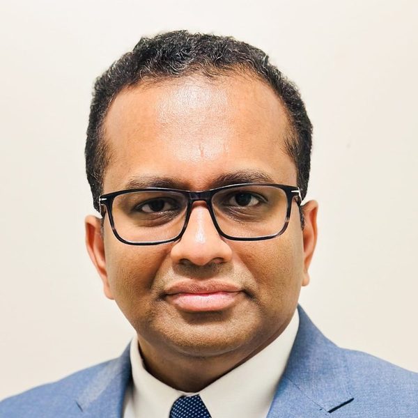 Rev. Dr. Tinku Thompson